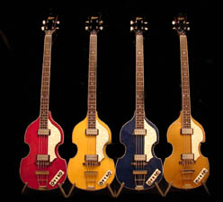 Limited edition custom color red, amber and gold top hofner basses